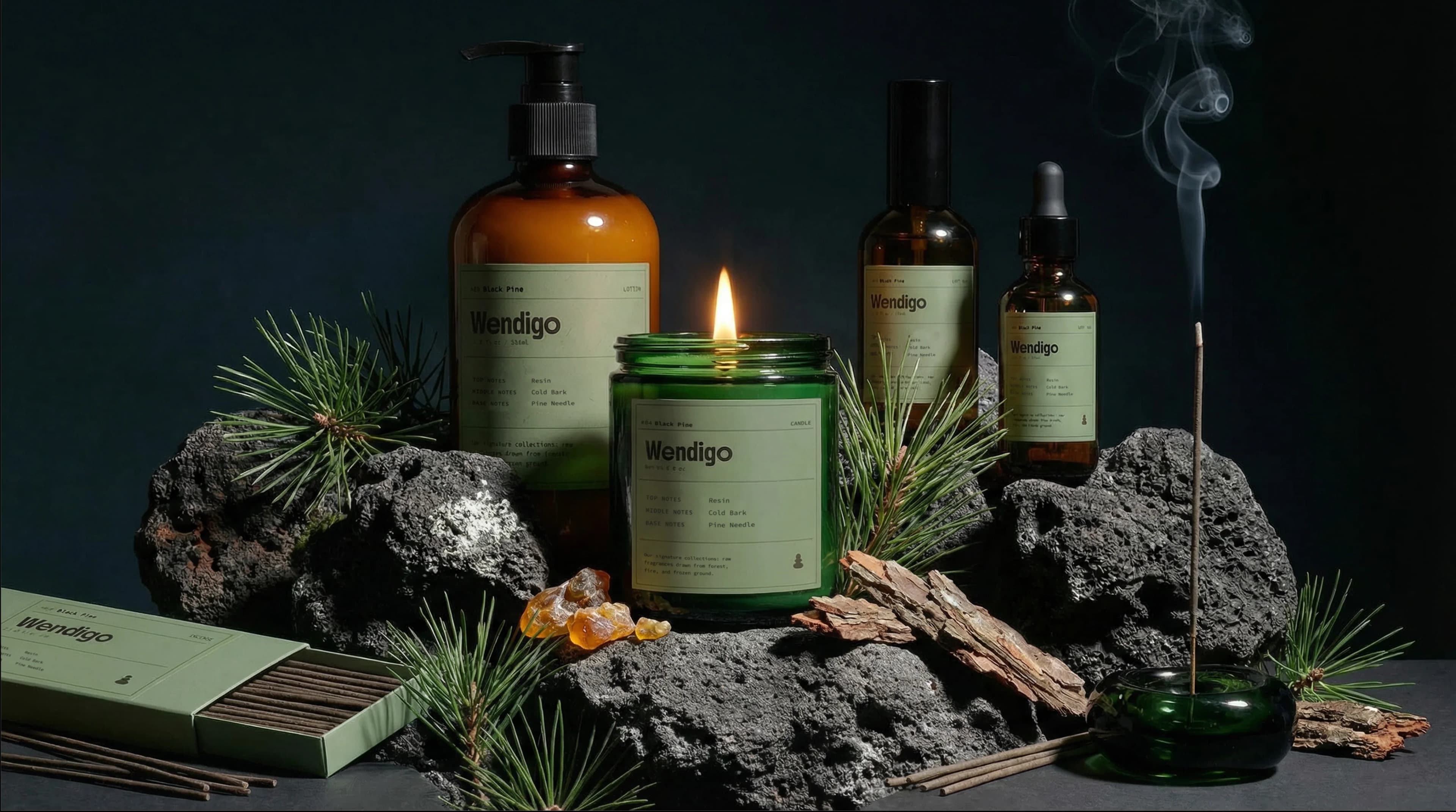 Wendigo Black Pine collection with pine needles, resin, and volcanic rock